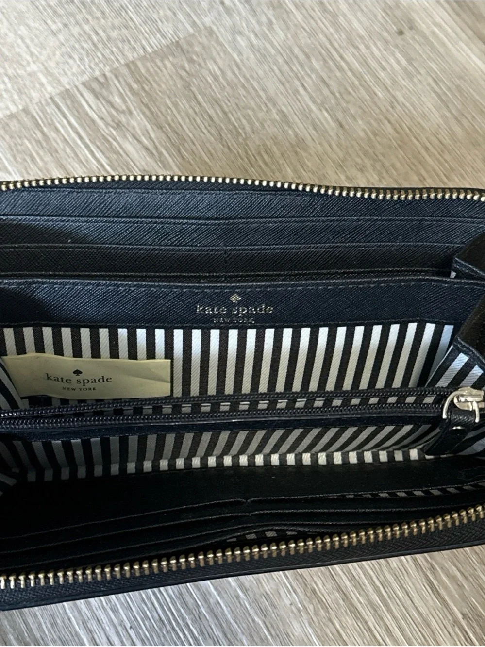 kate spade Black Saffiano Zip-Around Wallet with Gold Logo